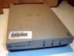 I used the enclosure of an old NetModem which was too slow by today's standards